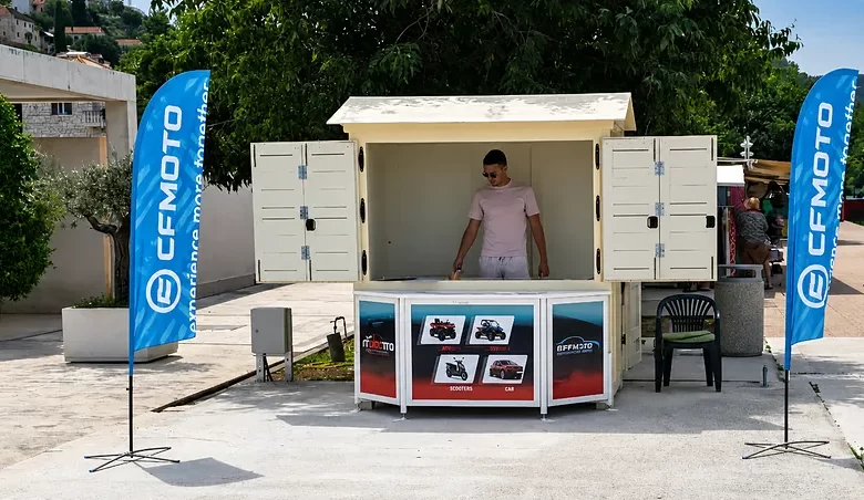 Rentamotorino vehicle pick-up point at Porat bb in Postira, Brač