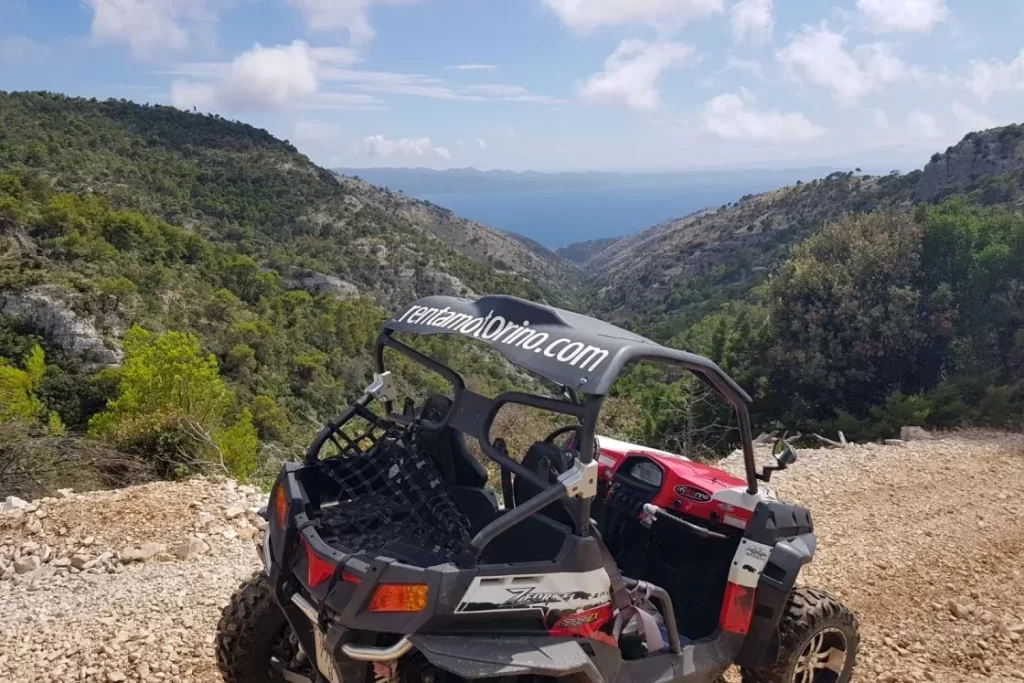Buggy overlooking green hills and the sea on Brač